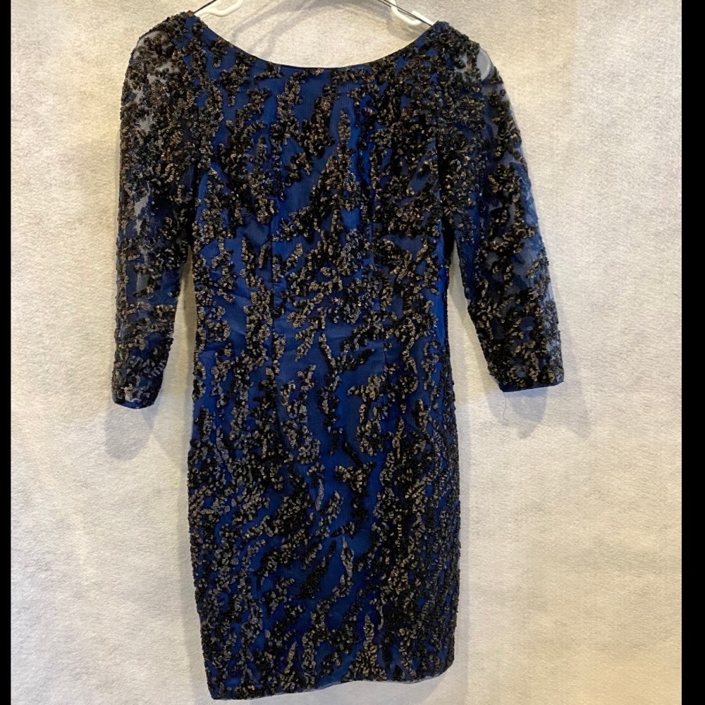 Long sleeve short beaded dress open back size: 0